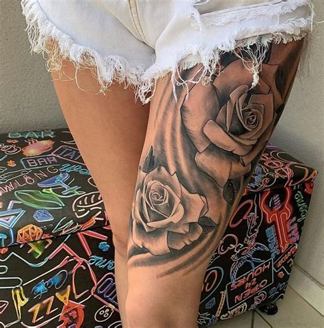 tatuagem feminina de flor na coxa|28 Inspirações para Tatuagens Femininas na Coxa:。